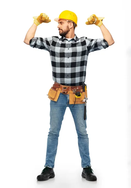 Male worker or builder in helmet showing his power — Stock Photo, Image