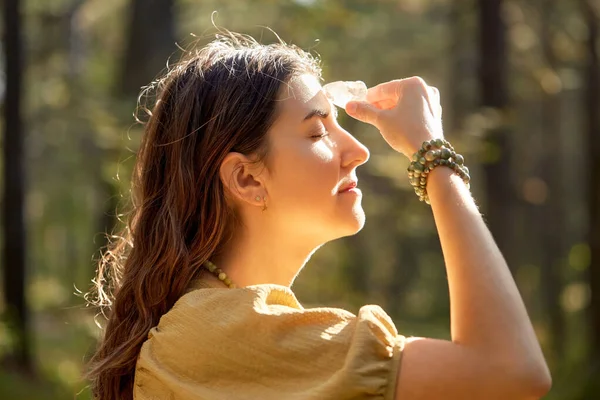 Woman or witch performing magic ritual in forest — Stock Photo, Image