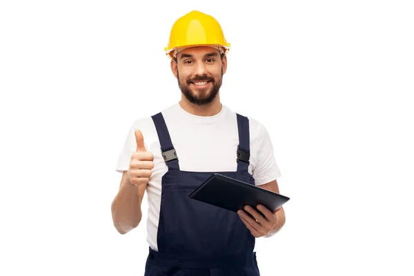 Trabajador o constructor con la PC tableta que muestra los pulgares hacia arriba —  Fotos de Stock