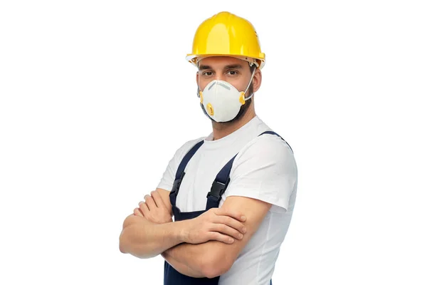 Mężczyzna pracownik lub budowniczy w kasku i respiratorze — Zdjęcie stockowe