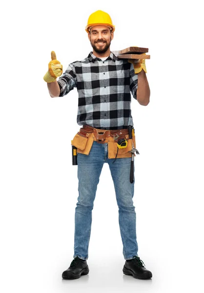 Worker or builder with boards showing thumbs up — Stockfoto