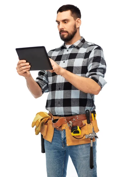 Builder with tablet computer and tools — Stock fotografie