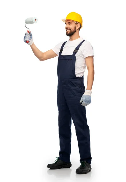 Male worker or builder with paint roller — Stock Photo, Image