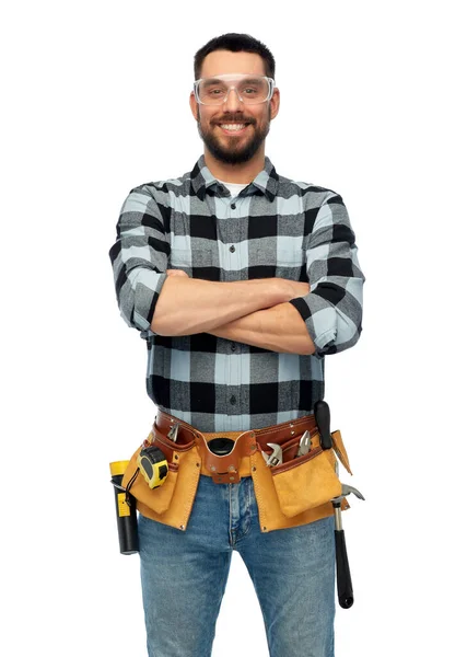 Happy male worker or builder with crossed arms — Stock Photo, Image