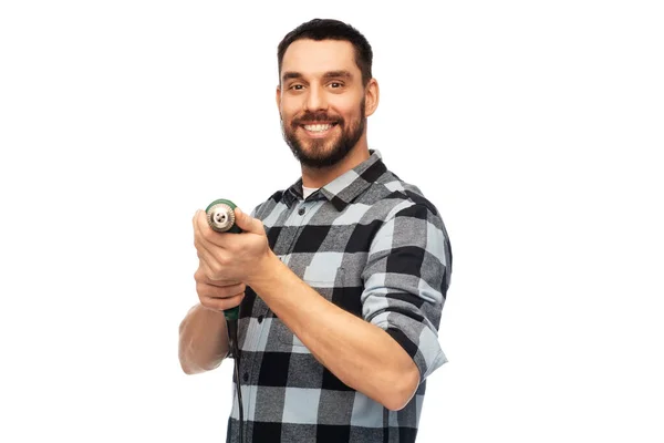 Happy man, worker or builder with drill — Stock Photo, Image