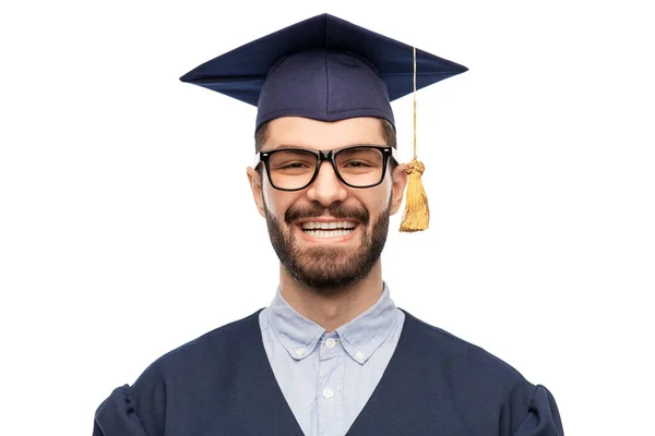 Postgraduální student v malty palubě a bakalářské šaty — Stock fotografie