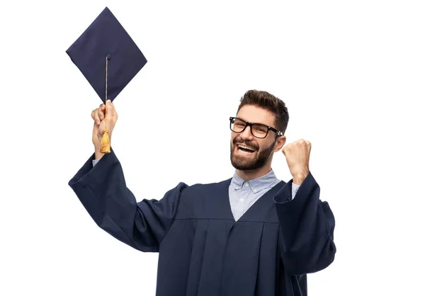 Estudante de pós-graduação feliz com placa de argamassa — Fotografia de Stock