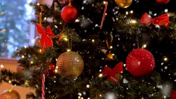 Decorated artificial christmas tree at home — Stock Video