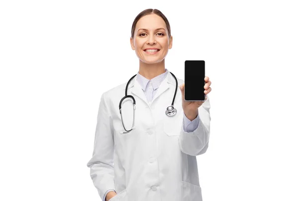 Femme heureuse médecin ou infirmière avec smartphone — Photo