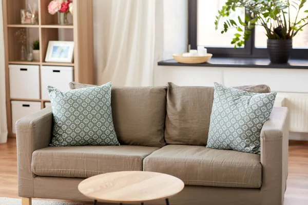 Sofa with cushions at cozy home living room — Stock Photo, Image