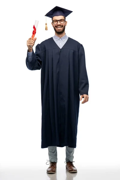 Male graduate student in mortar board with diploma — Stock Photo, Image