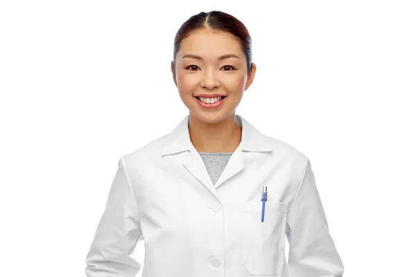 Happy smiling asian female doctor in white coat — Stock Photo, Image