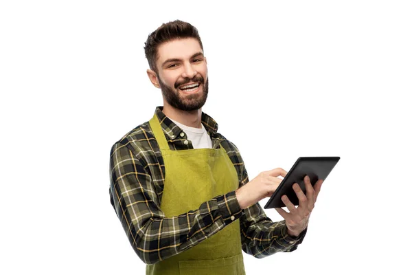 Χαρούμενος αρσενικός κηπουρός ή αγρότης με tablet pc — Φωτογραφία Αρχείου