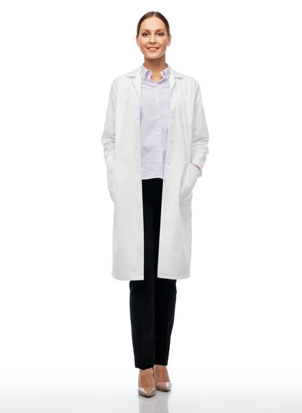 Smiling female doctor or scientist in white coat — Stock Photo, Image