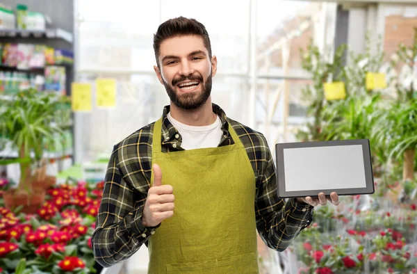 Tablet bilgisayarlı çiçek satıcısı onay verdi — Stok fotoğraf