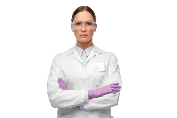 Female scientist in goggles and gloves — Stock Photo, Image