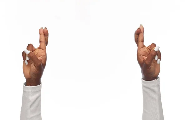 African american woman showing crossed fingers — Stock Photo, Image