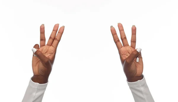 African american woman showing six fingers — Stock Photo, Image