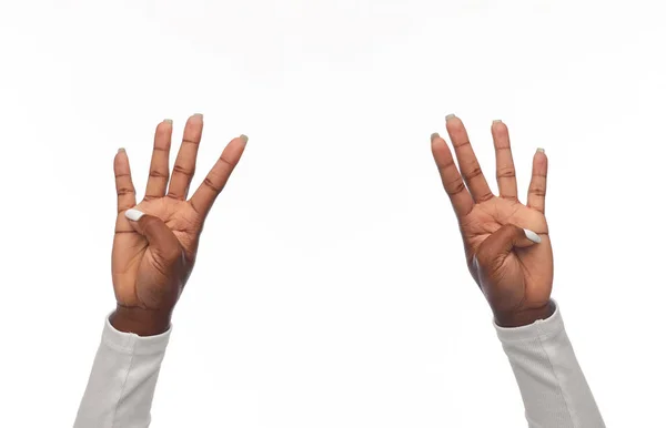 African american woman showing eight fingers — Stock Photo, Image