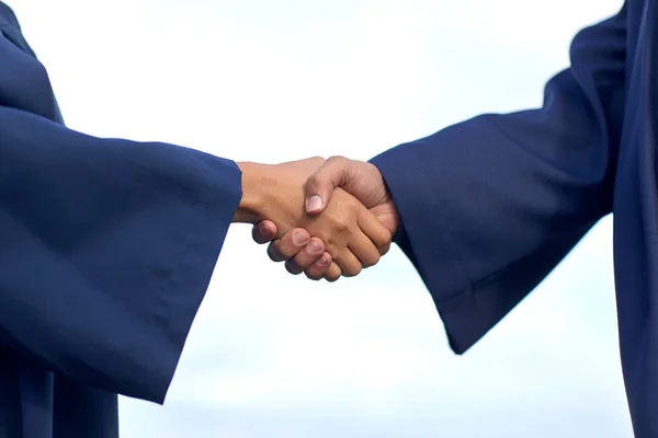 Graduate students or bachelors greeting each other — Stock Photo, Image