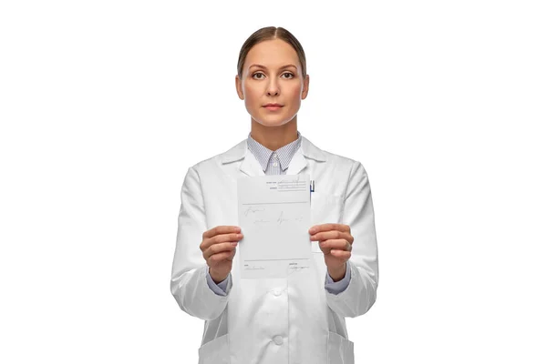 Female doctor with prescription blank — Stock Photo, Image