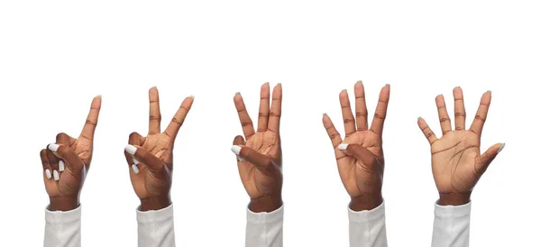 Hands of african american women showing fingers — Stock Photo, Image