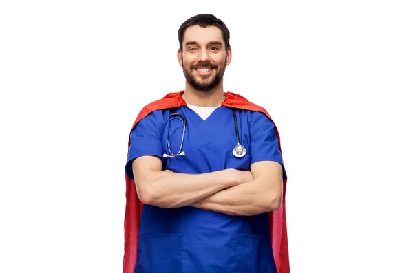 Smiling doctor or male nurse in superhero cape — Stock Photo, Image