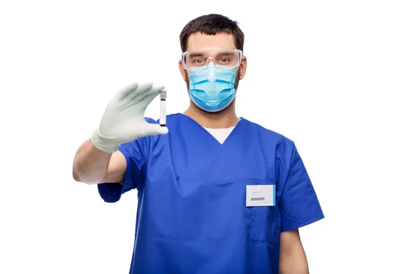 Male doctor in mask with blood in test tube — Stock Photo, Image