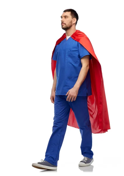 Doctor or male nurse in superhero cape walking — Stock Photo, Image