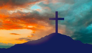 silhouette of cross on calvary hill over sky clipart