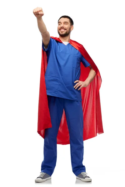Smiling doctor or male nurse in superhero cape — Stock Photo, Image