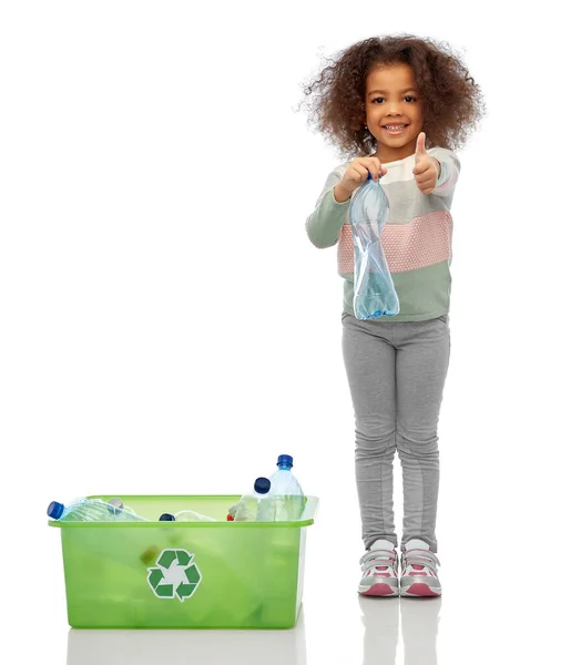 Happy african american girl sorting plastic waste Stock Picture