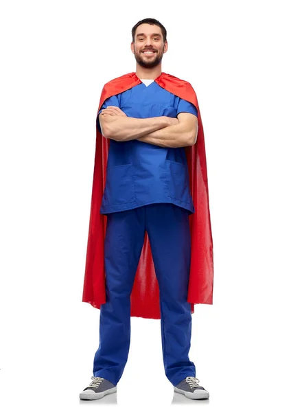 Smiling doctor or male nurse in superhero cape — Stock Photo, Image