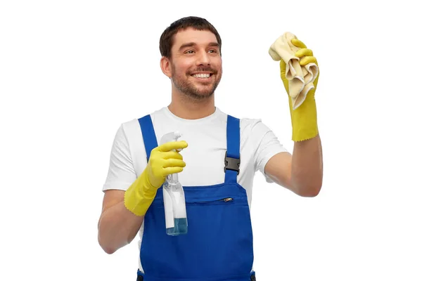 Male cleaner cleaning with rag and detergent — Stock Photo, Image