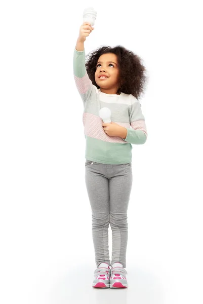 African american girl with different light bulbs — Stock Photo, Image