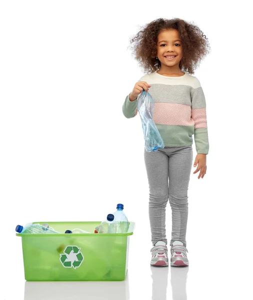 Happy african american girl sorting plastic waste — Stock Photo, Image