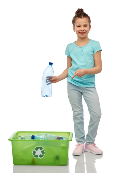 Smiling girl sorting plastic waste — Stock Photo, Image