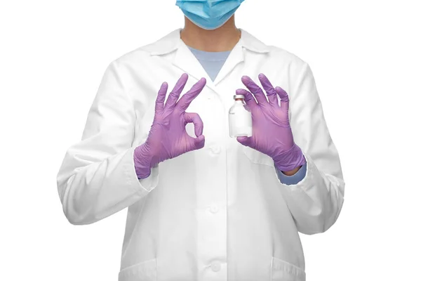 Close up of doctor with medicine showing ok sign — Stock Photo, Image