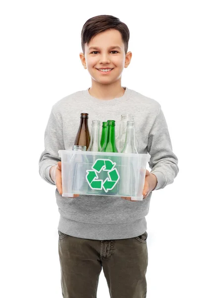 Smiling boy sorting glass waste — Stock Photo, Image