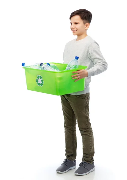 Smiling boy sorting plastic waste — Stock Photo, Image