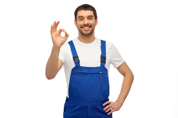 Happy smiling male worker or builder showing ok — Stock Photo, Image