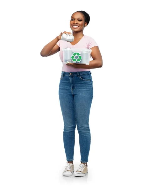 African american woman sorting metallic waste — Stok Foto