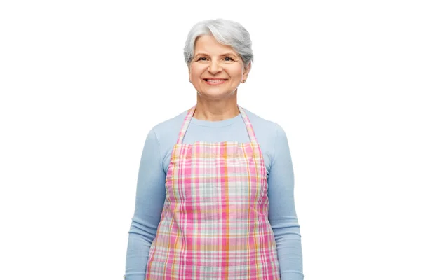 Retrato de mujer mayor sonriente en delantal —  Fotos de Stock