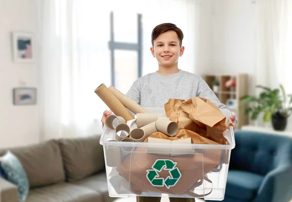 Smiling boy sorting paper waste — Stock Photo, Image