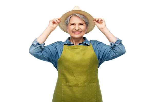 Retrato de mulher sênior sorridente no avental de jardim — Fotografia de Stock