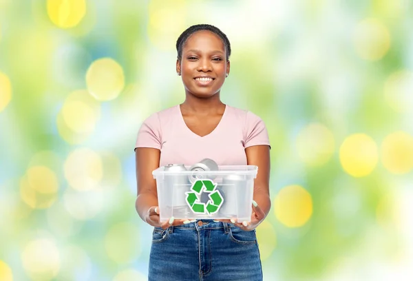 African american woman sorting metallic waste — Stock Photo, Image