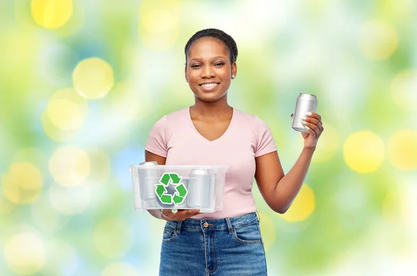 African american woman sorting metallic waste — Stock Photo, Image