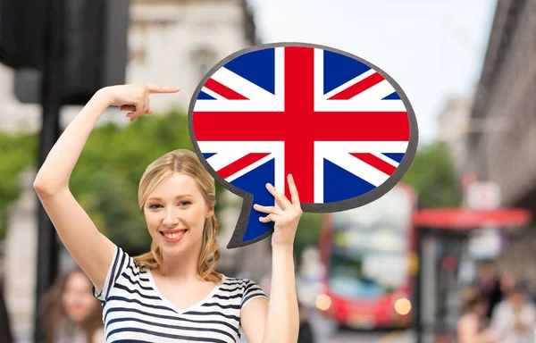 Smiling woman with british flag on text bubble — Stock Photo, Image