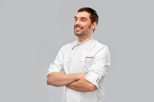 Happy smiling male chef with crossed arms — Stock Photo, Image