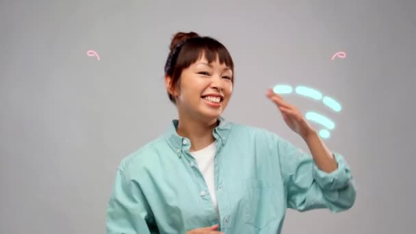 輝く線で踊る幸せなアジアの女性 — ストック動画